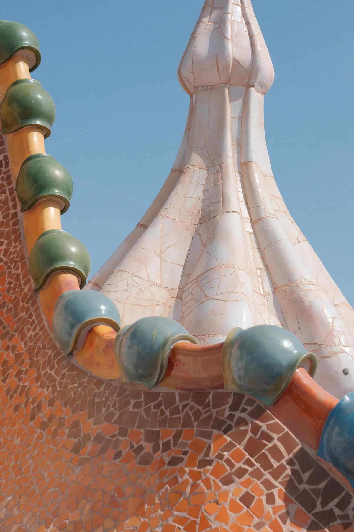 a-girls-passport-travel-blog-europe-spain-barcelona-casa-batllo-roof-tower-mosaic